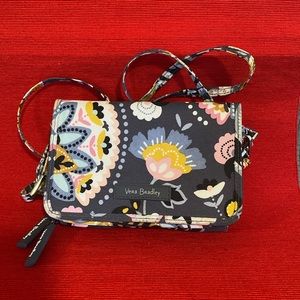 Vera  Bradley multi use small bag.